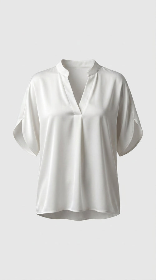 Blusa blanca de cuello en V y corte fluido
