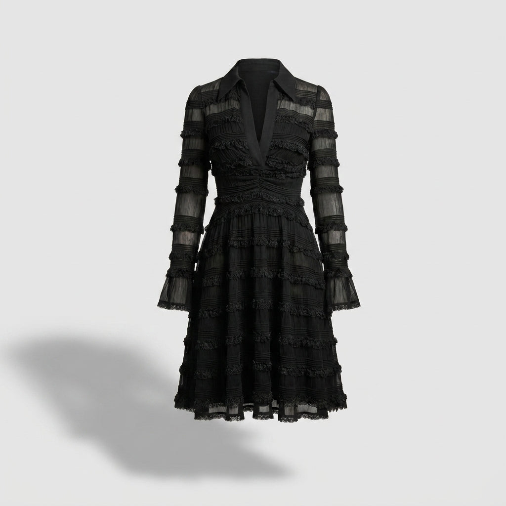 Vestido midi negro con flecos y transparencias