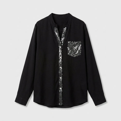 Blusa negra con detalles brillantes