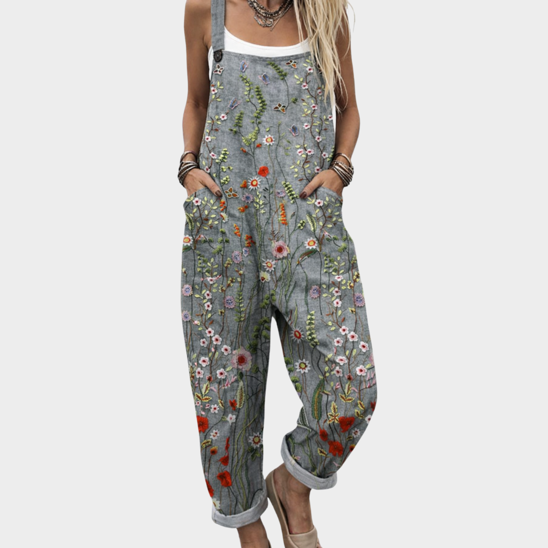 Mono gris de tirantes con flores