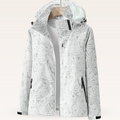 Chaqueta impermeable blanca con estampado de hojas