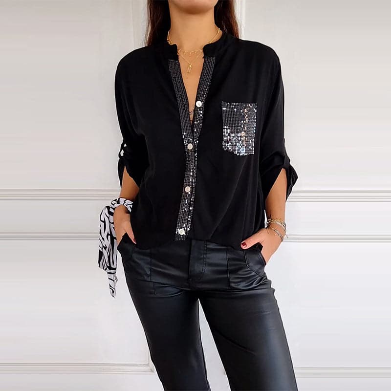 Blusa negra con detalles brillantes
