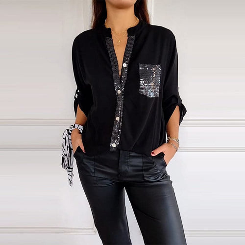 Blusa negra con detalles brillantes