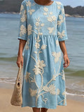 Vestido azul con motivos florales
