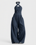 Mono azul oscuro de escote cruzado y pierna ancha